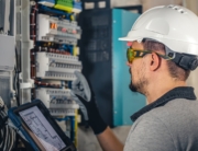 Technician upgrading electrical panel