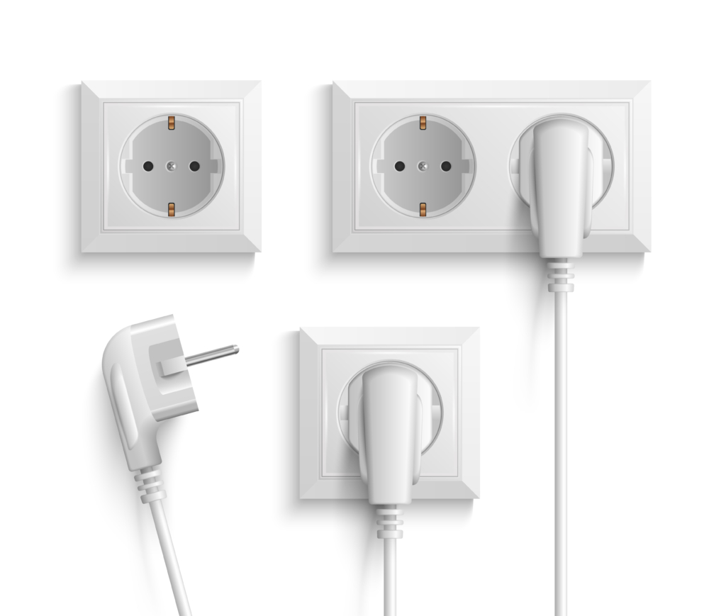 A white electrical outlet with plugs