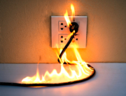 Picture of a wire caught fire while plugged into an outlet